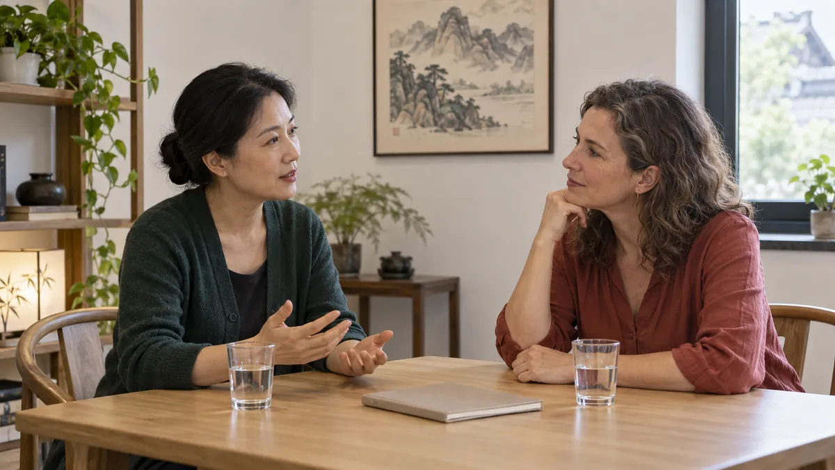 Two adults having a thoughtful conversation across a table in a Chinese-style office, an AI-generated illustrative scene.